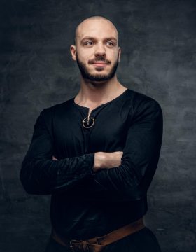 portrait-shaved-head-male-dressed-native-viking-s-costume